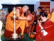 H. H. the Dalai Lama giving blessings to Rev. Gensei, Vice President.