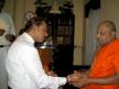President receiving blessings from Mahanayake Maha Thero.